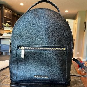 Michael Kohl’s black backpack